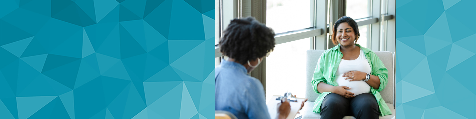 Smiling pregnant woman in therapy session with counselor.